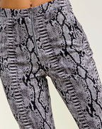 Snake print zip front trousers