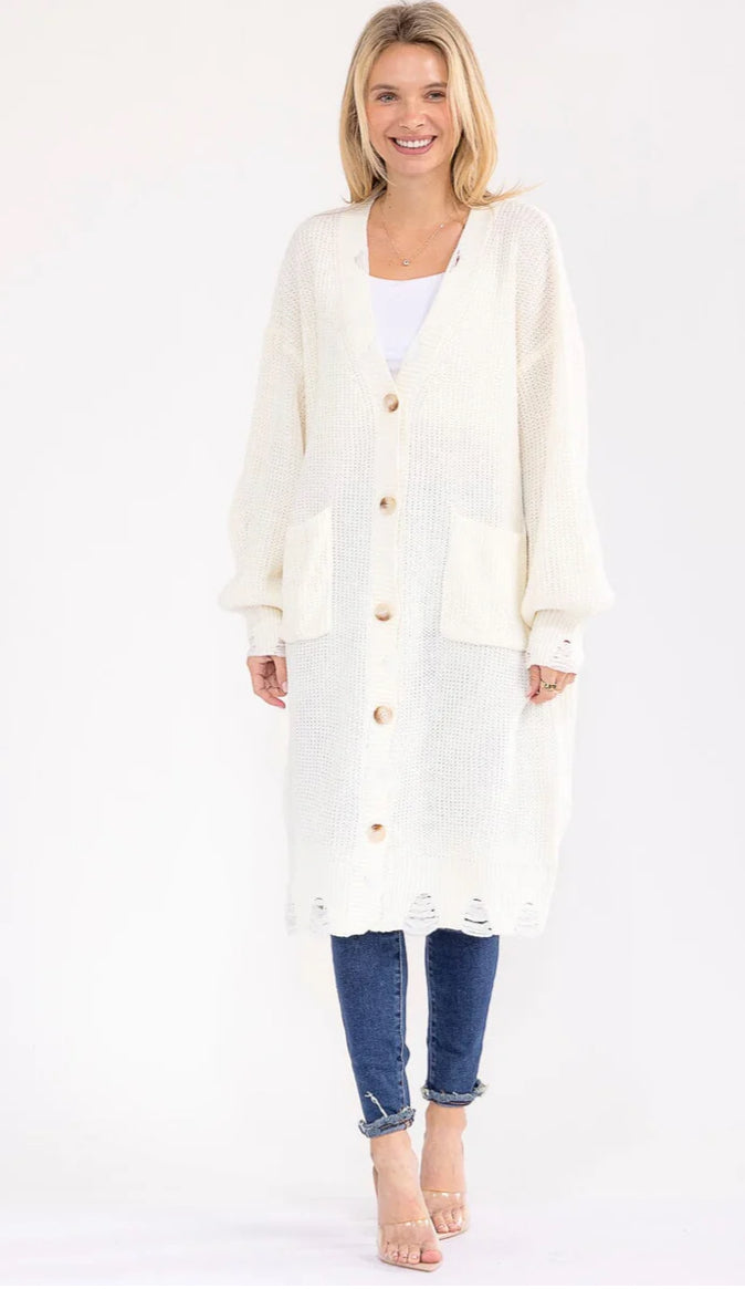 Long frayed knit sweater