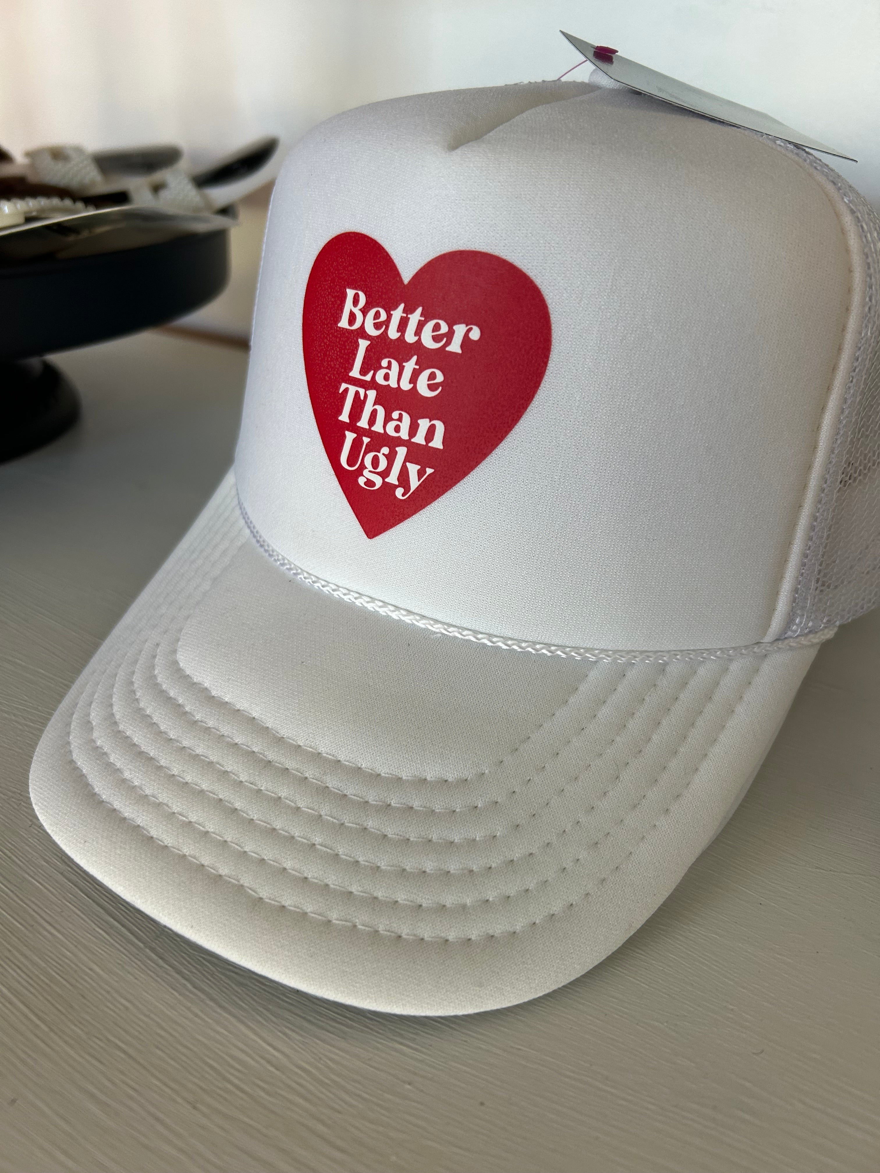 Better late than ugly trucker hat