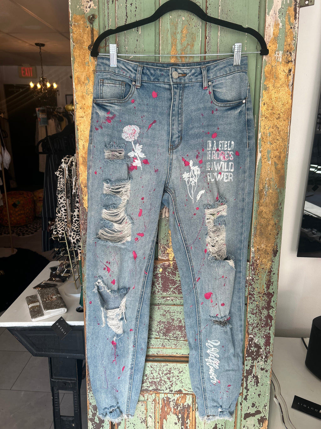 In a field of roses be a wildflower jeans