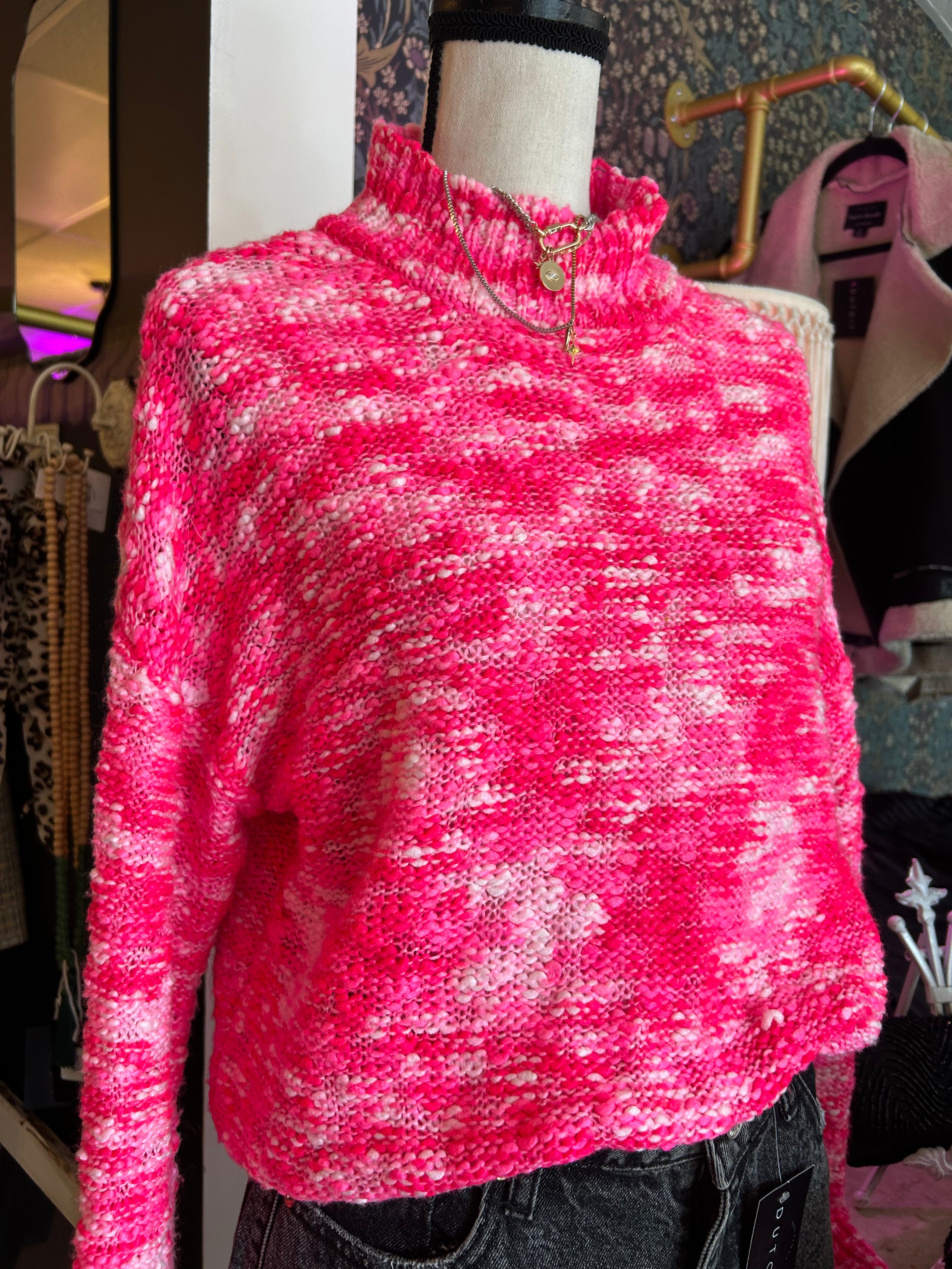 Bright pink knit sweater
