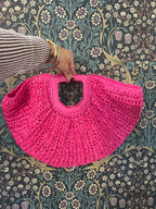 Hot pink weaved handbag