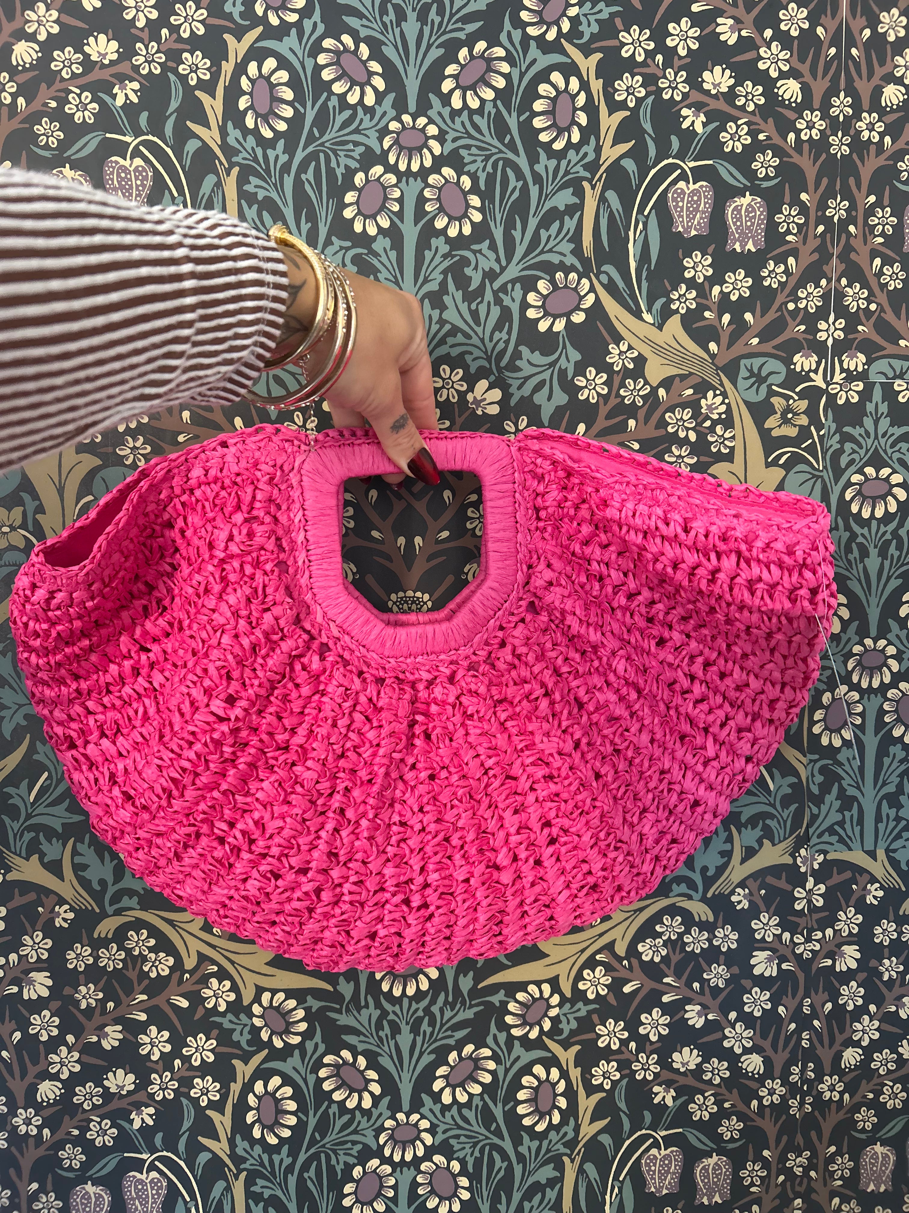 Hot pink weaved handbag