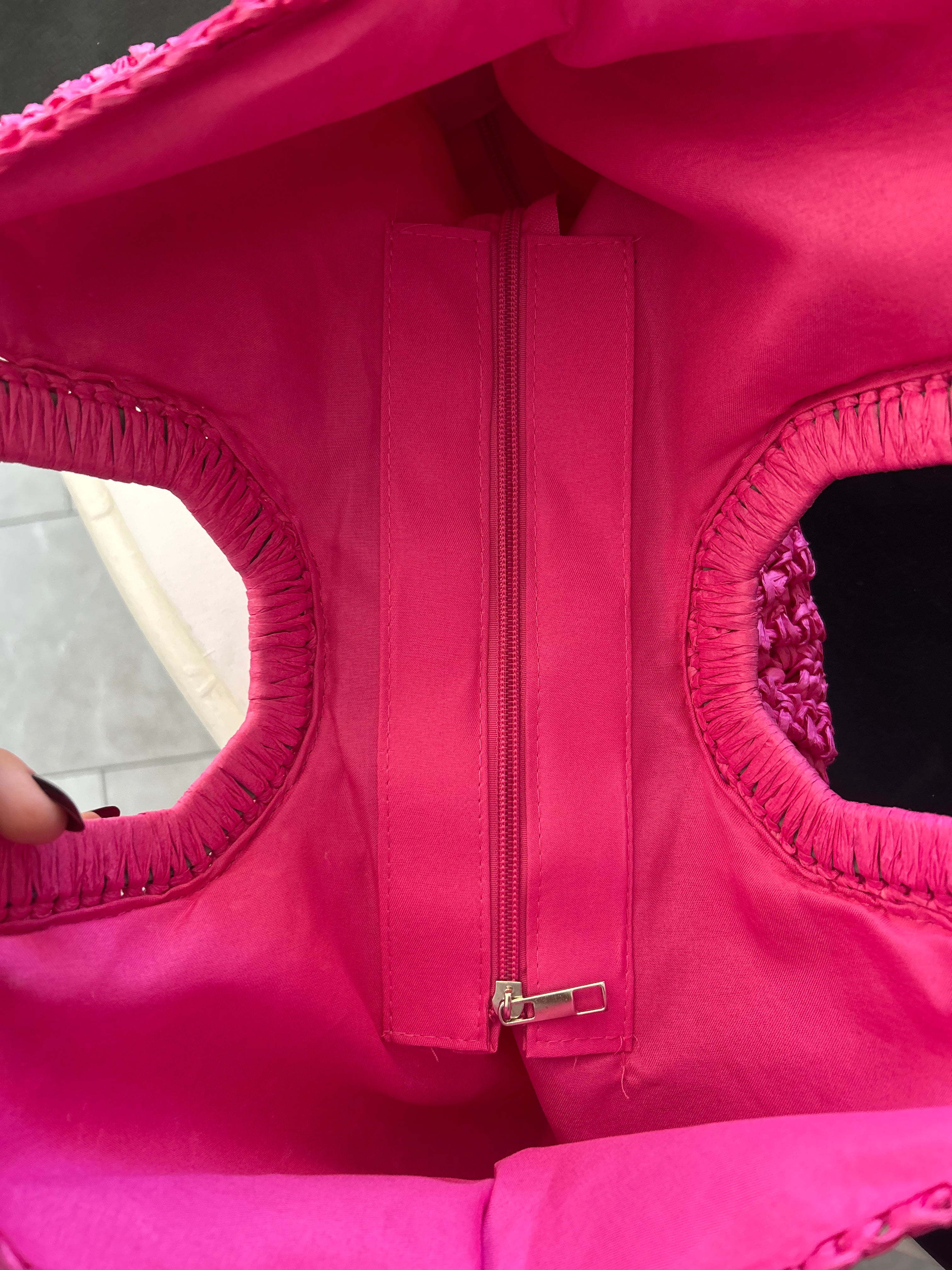 Hot pink weaved handbag