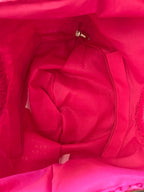 Hot pink weaved handbag