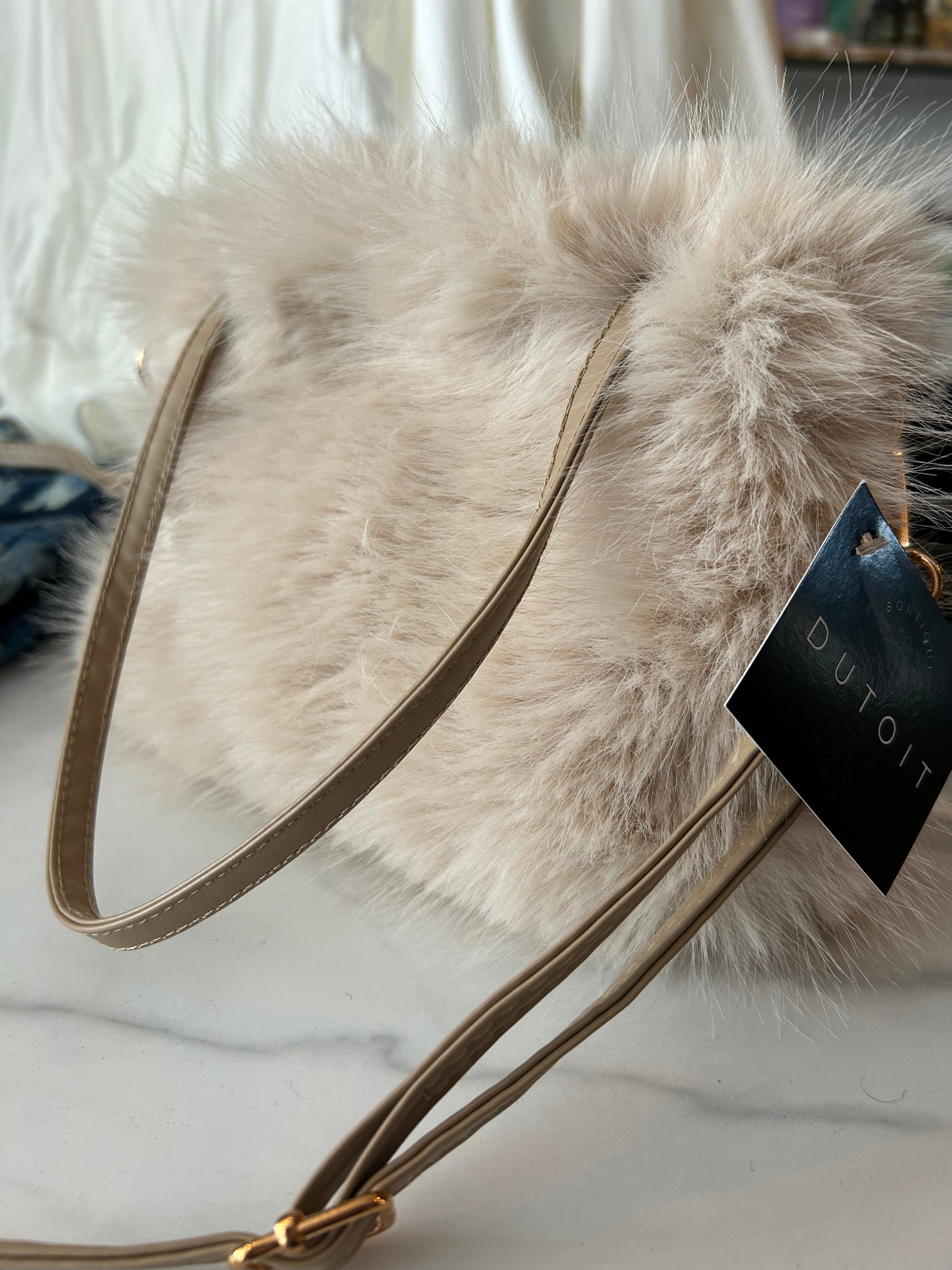 Fuzzy cream colored bag