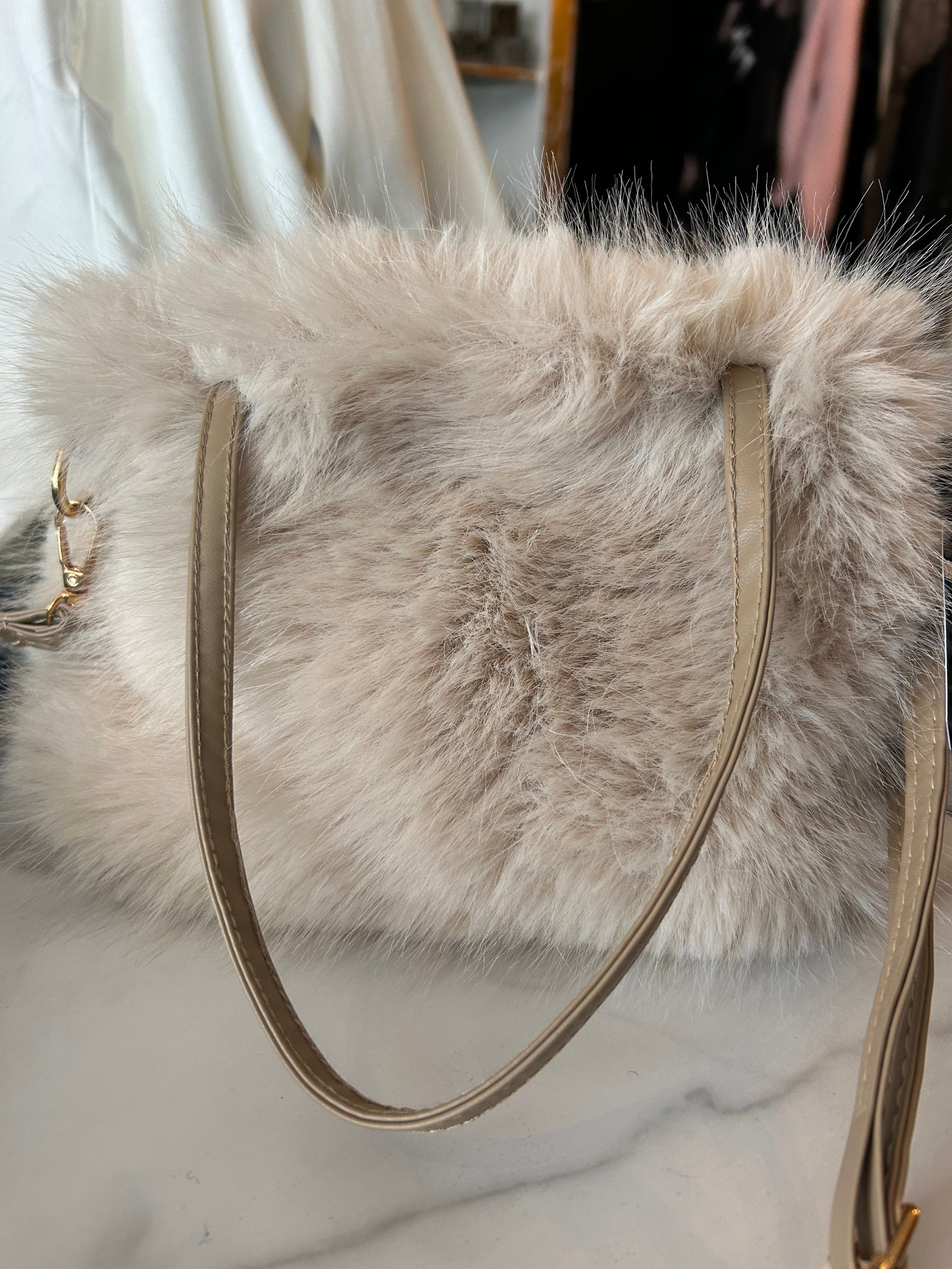Fuzzy cream colored bag